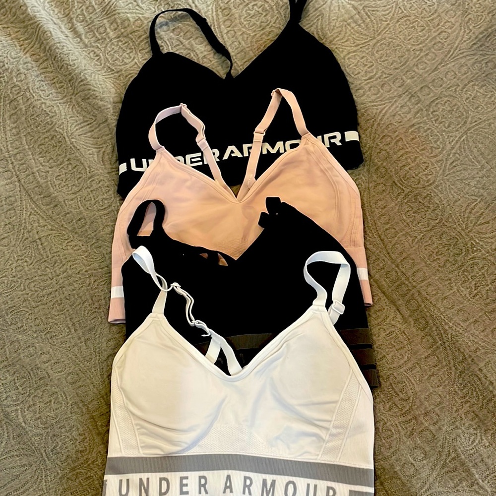 Set of 4 compression sports bras.